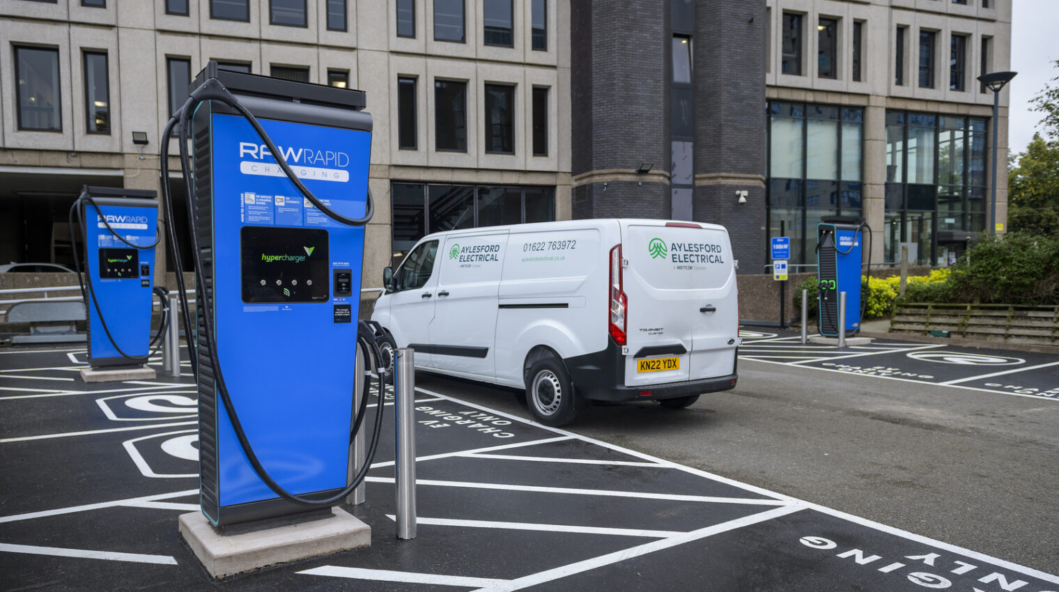 EV Chargers office car park | Aylesford Electrical | Safeguarding electrical systems in commercial and industrial environments